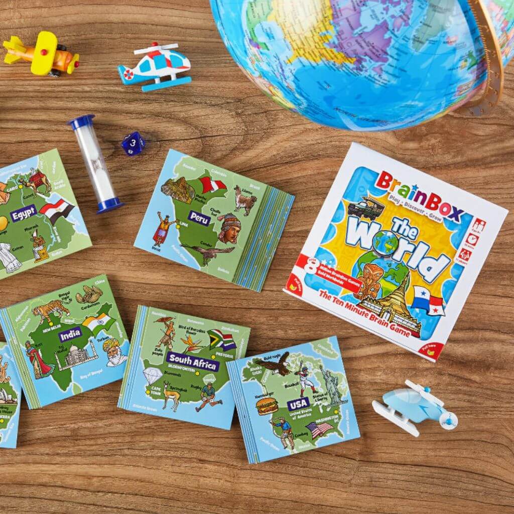 Playing cards and toys inside of Brainbox Cities of the World