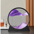 Purple large moving sand art in Australia on a black table and grey background