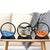 Sand art sandscapes blue, black, orange on a wooden table