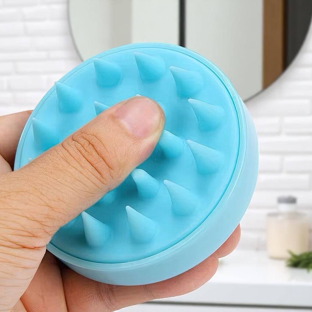 Scalp massager brush with silicone bristles