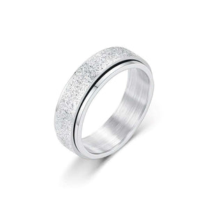 Silver fidgeting ring on white background