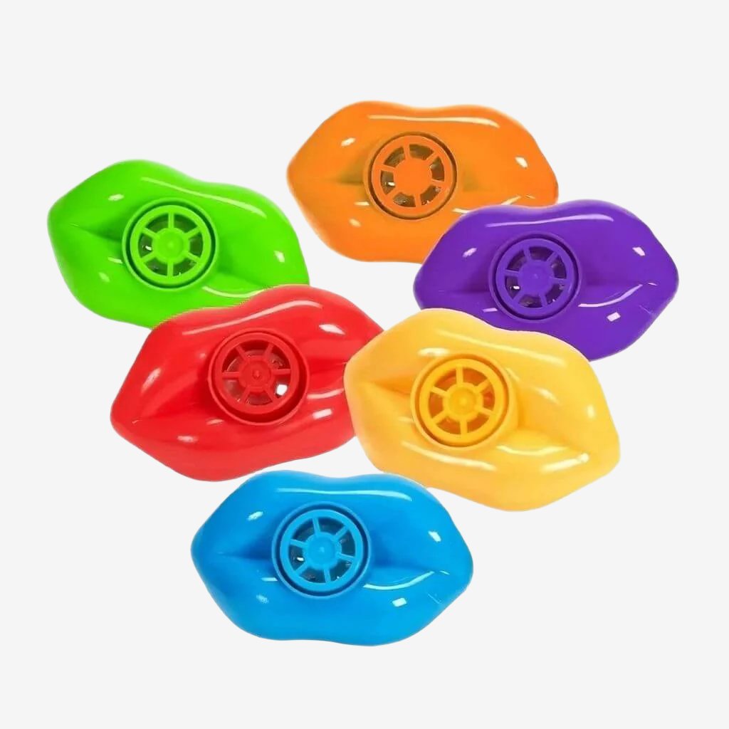 Six multicolored lip whistles on a white background