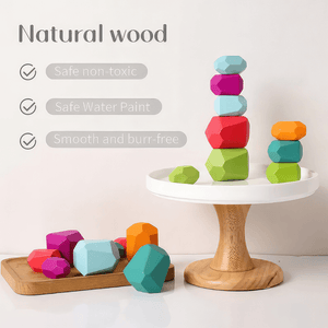Stacking stones on a wooden cake display info-graphic