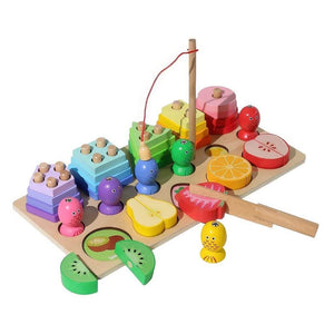 Stacking toy with shapes, fish and fruits on white background