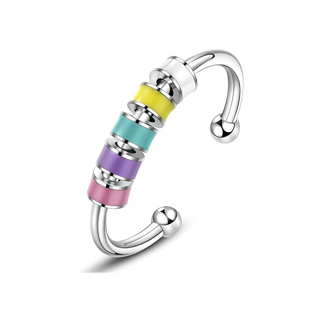 Stainless steel adjustable fidget ring with enamel beads pink on white background