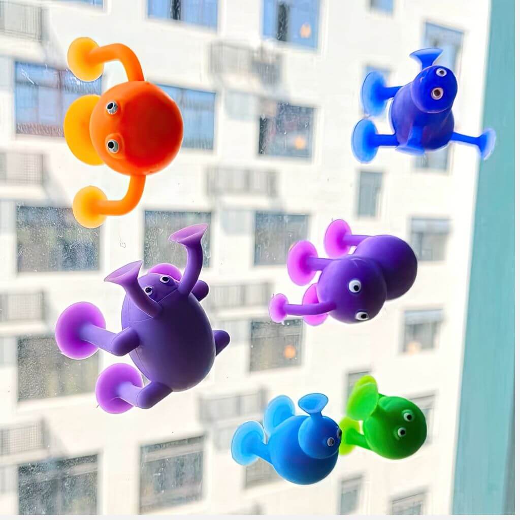 Suction cups toys on a window