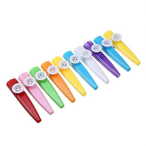 Ten multicolored kazoos lined up on a white background
