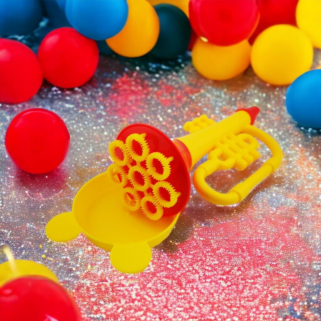 Trumpet multiple bubble blower and tray with balloons in background