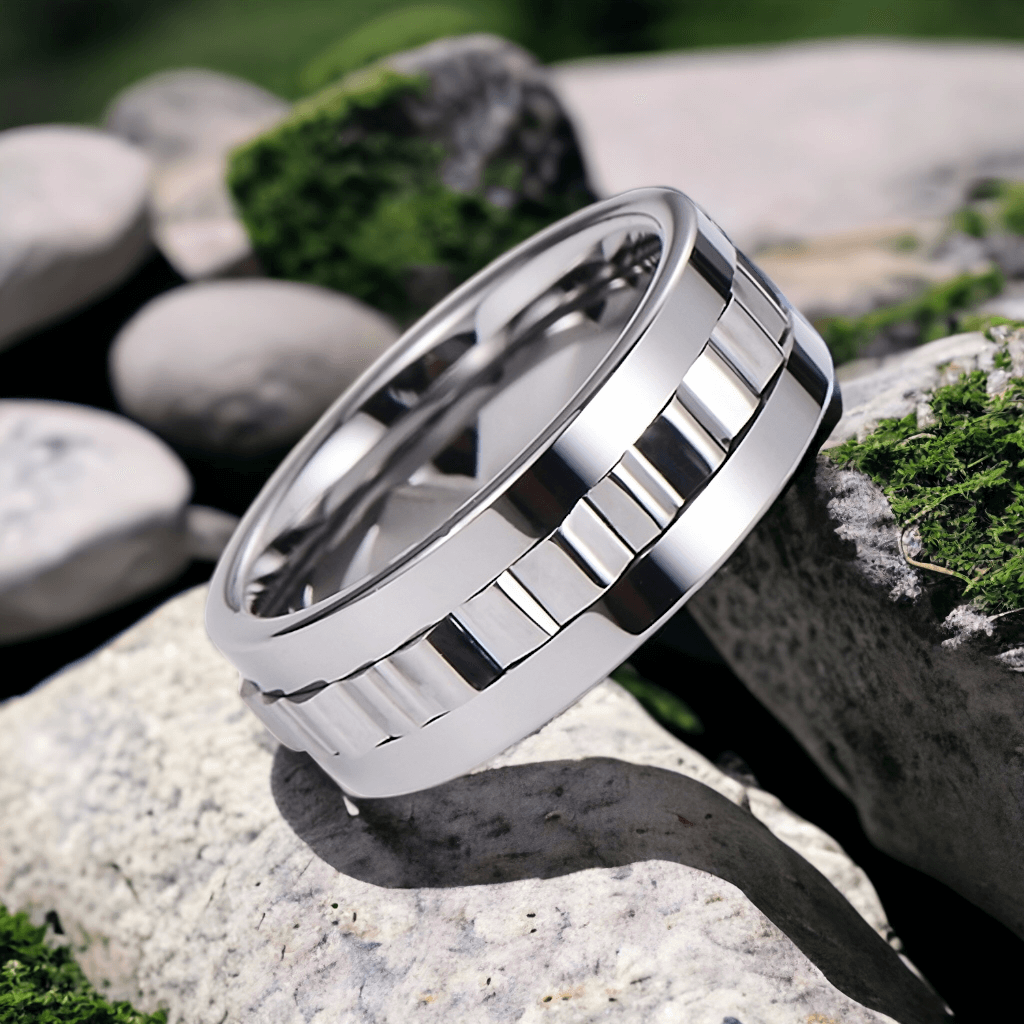 Tungsten ring on a stone surface with a natural background