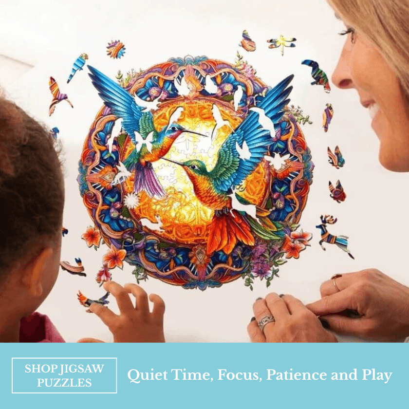 Woman and girls making a wooden jigsaw puzzle