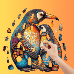 Woman's hand next to a penguins jigsaw puzzle with animal shaped pieces on gradient background