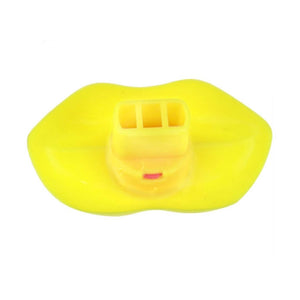 Yellow lip whistle on a white background back view