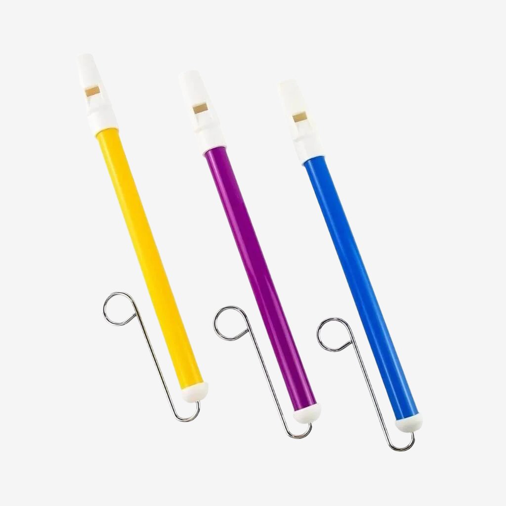 Yellow, purple and blue slide whistles on a white background