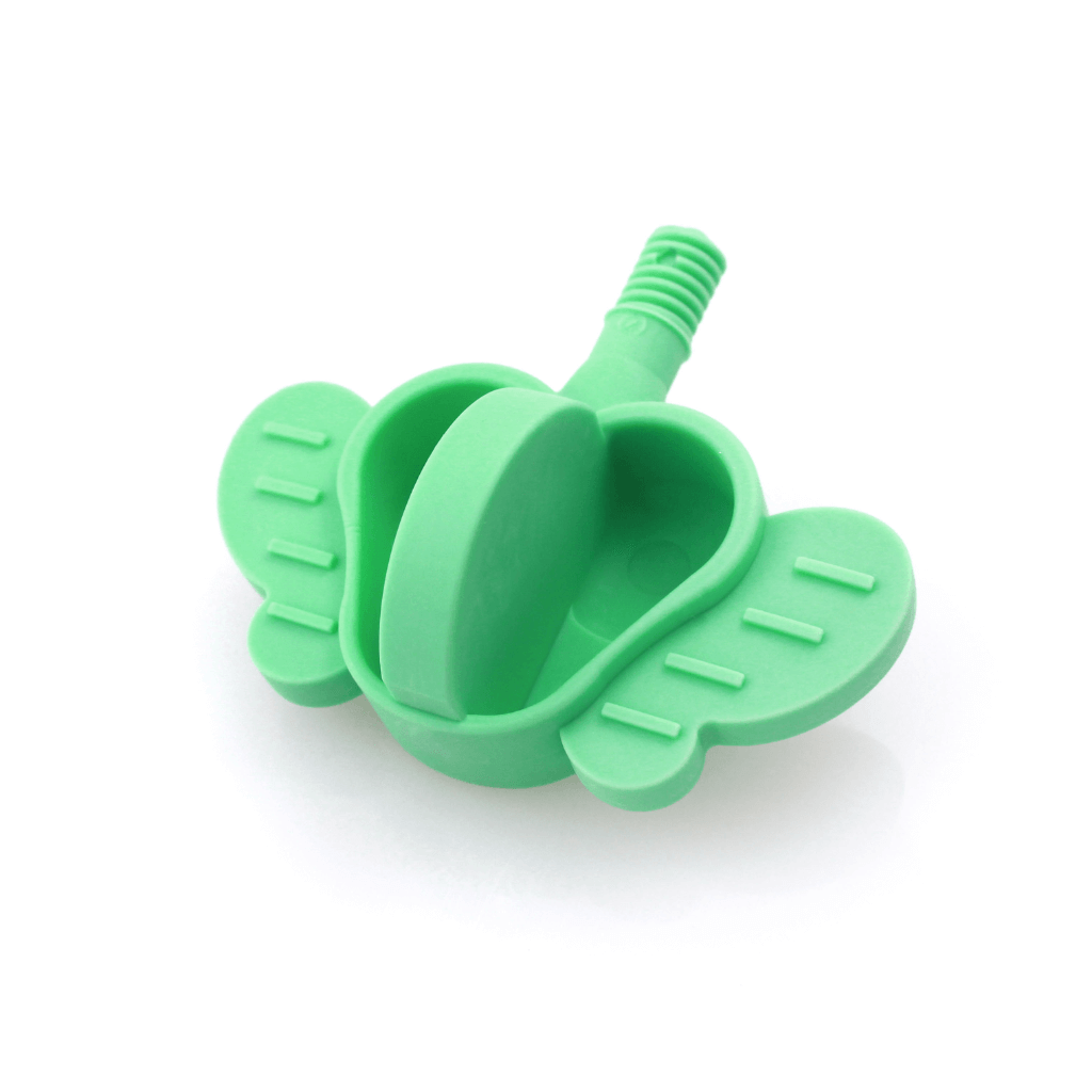 Z-Vibe dog tip facing down on a white surface