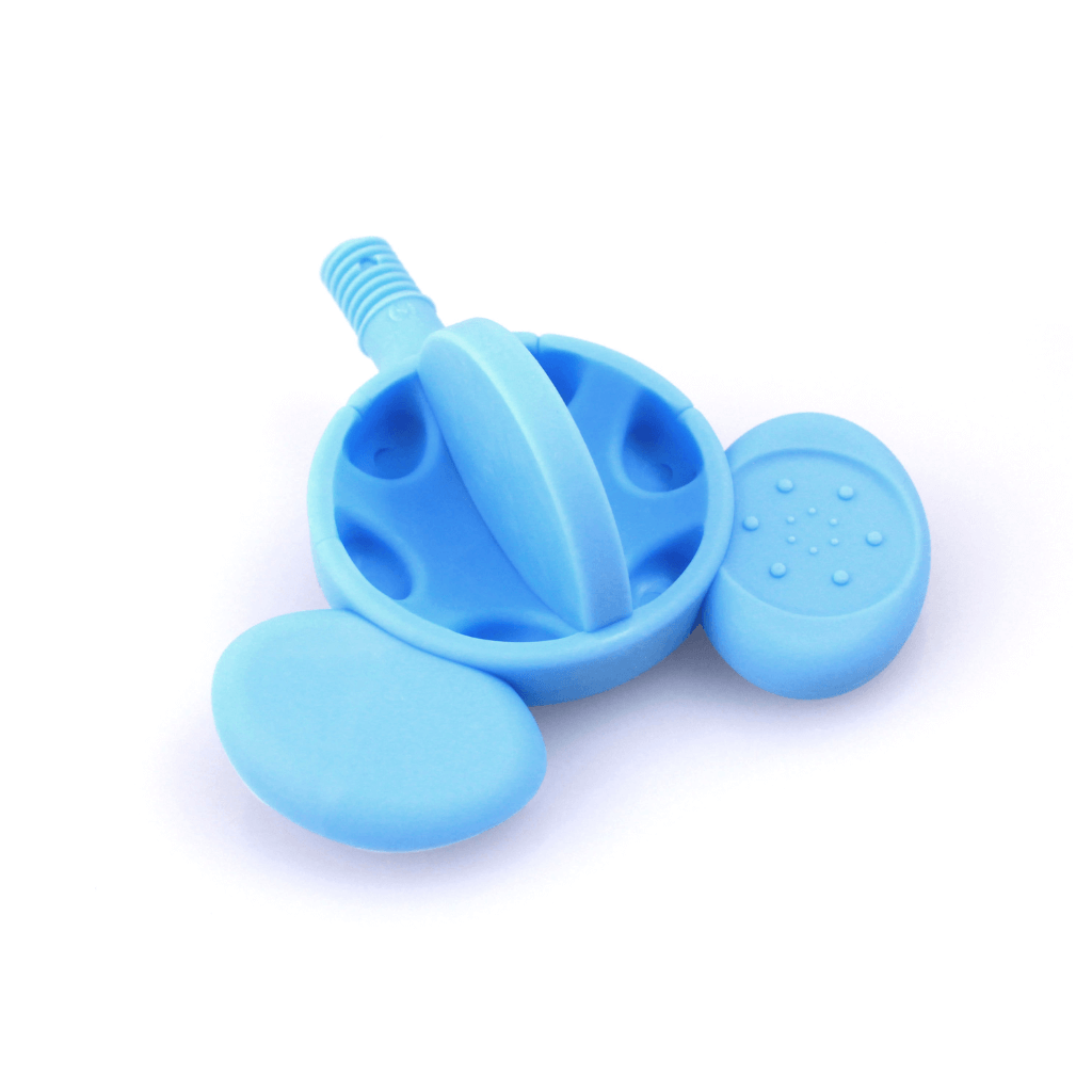 Z-Vibe mouse tip facing down on a white surface