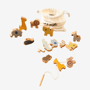 Zoo wooden threading beads and cotton bag on a white background