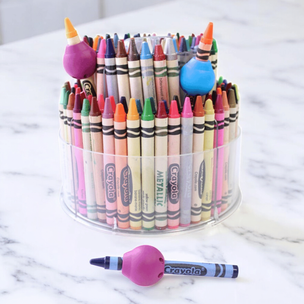 Ark butter pencil grip web space opener on a marble counter top