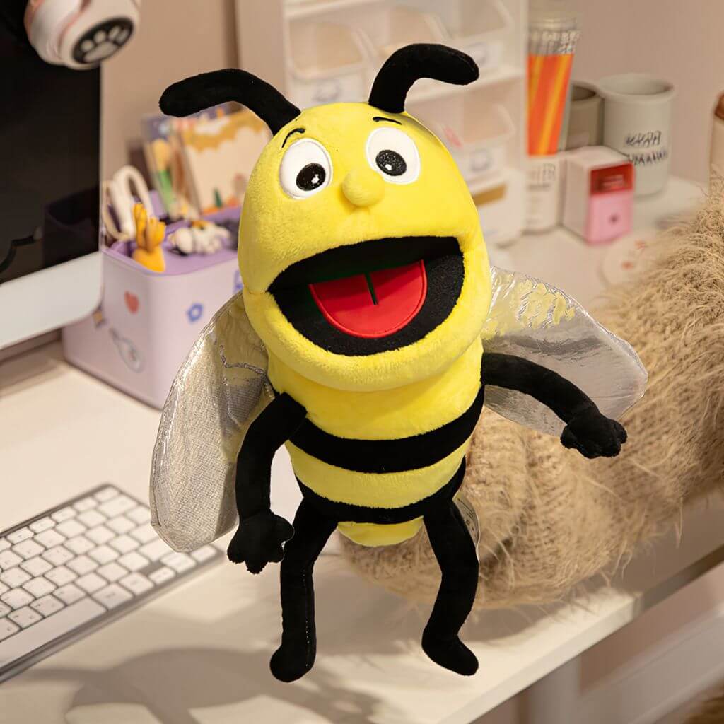 Bee hand puppet used in playroom setting for interactive storytelling and creative play