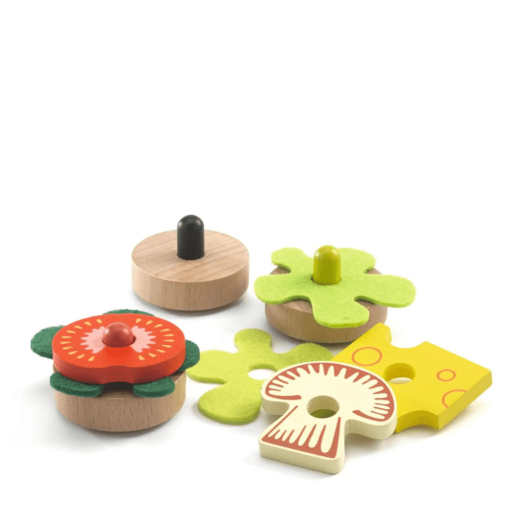 Djeco Mia and Leo appetizer set components including wooden toppings crackers and food pieces