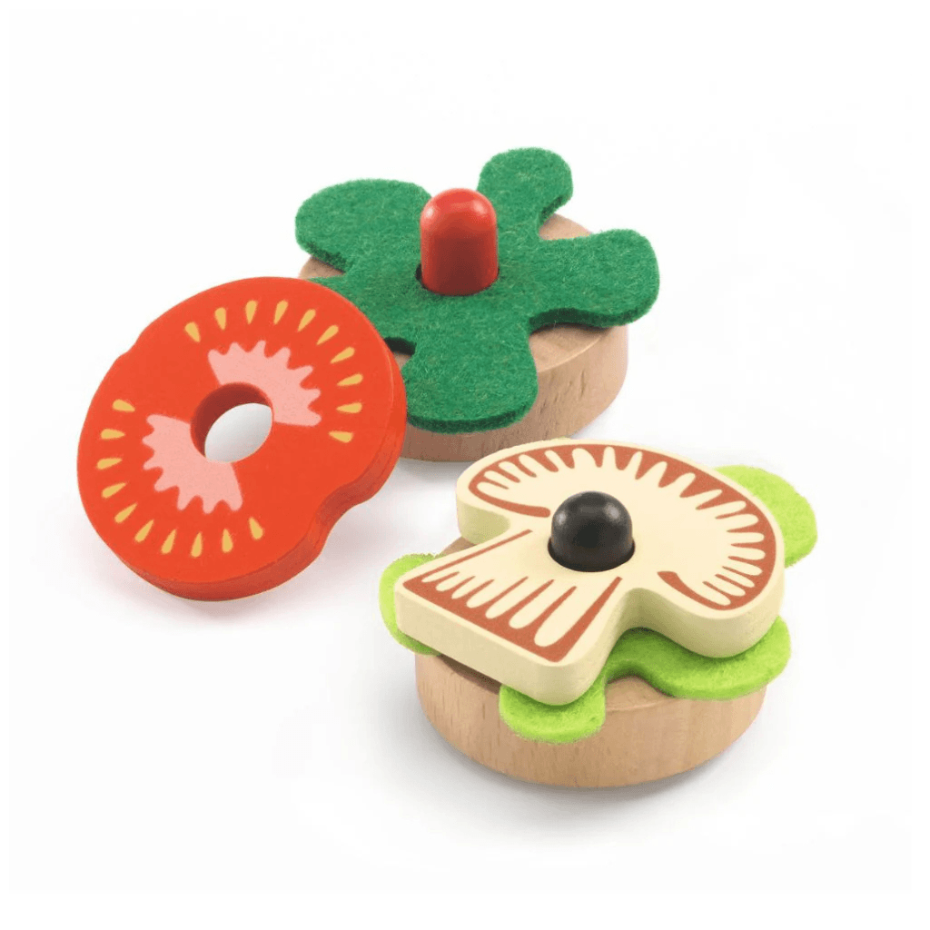 Close up of Djeco Mia and Leo appetizer wooden sandwich toppings and crackers for pretend play