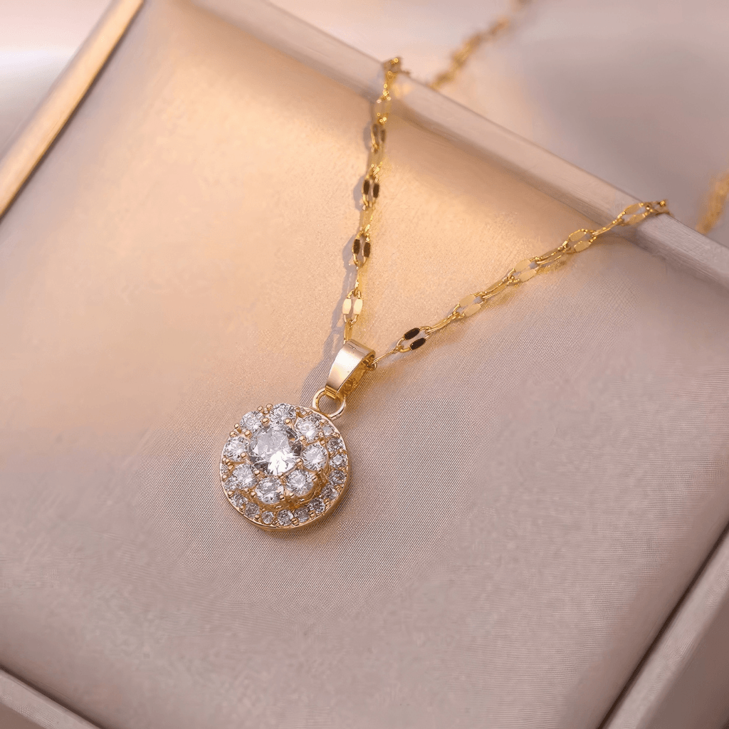 Gold plated crystal pendant necklace with cubic zirconia in a pink jewellery box