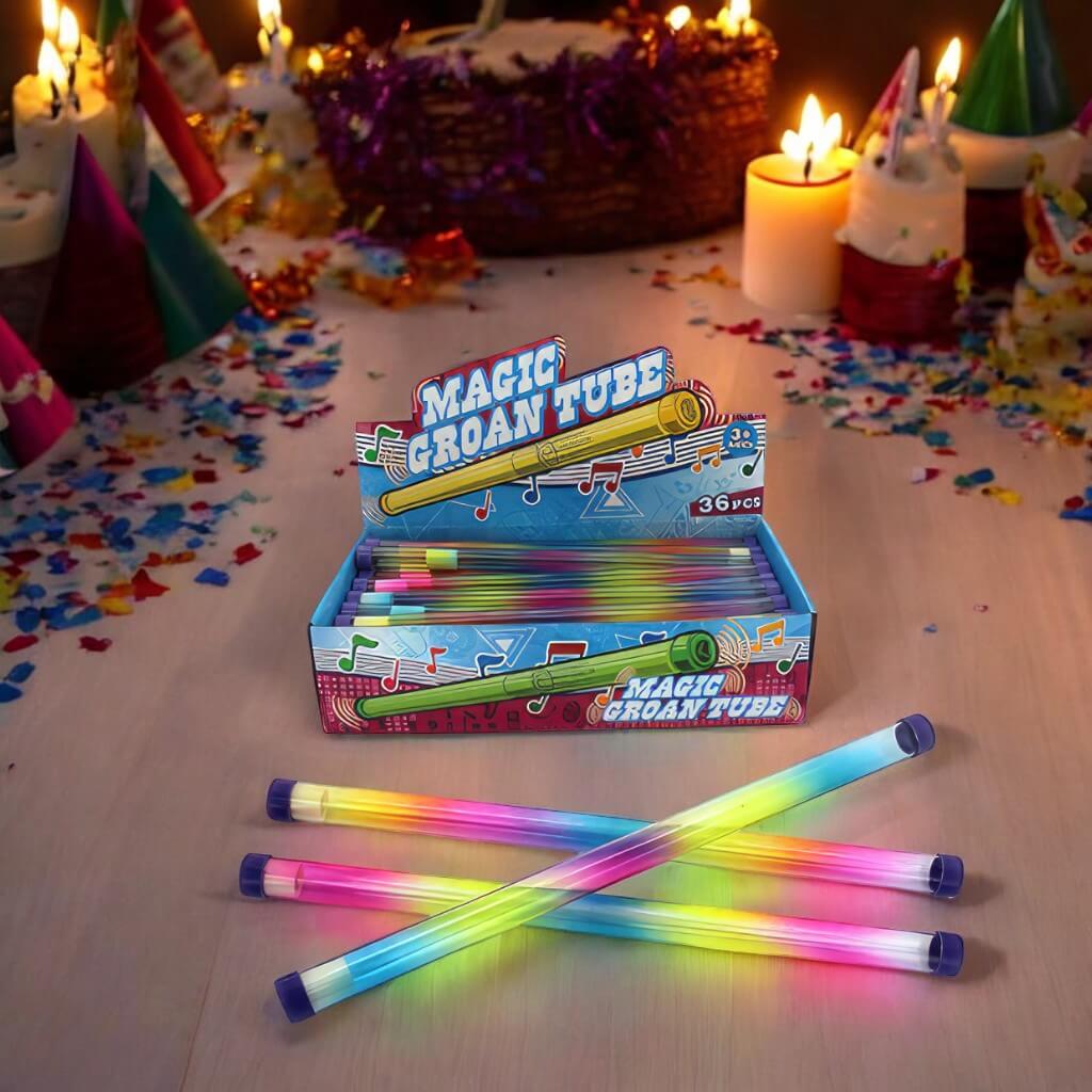 groan tubes rainbow and box on a table