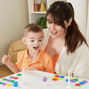 Mom teaching kid ThinkFun My First Math Dice