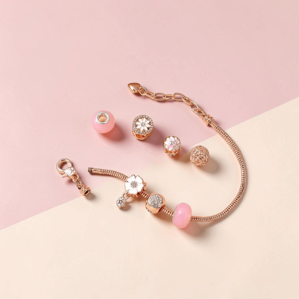 pandora style rose gold charm bracelet with charms shown separately — 7 moveable charms — Sensory Stand Australia
