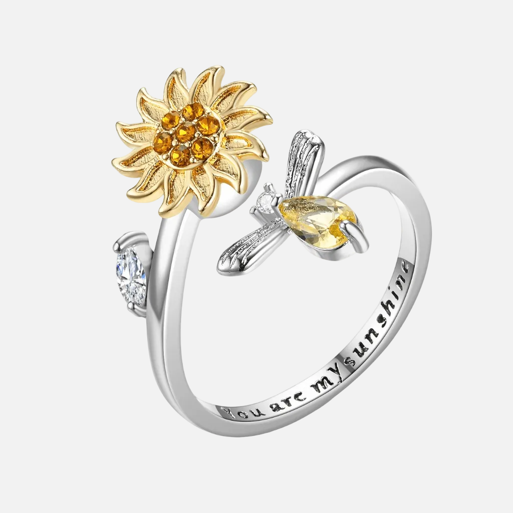 Two-tone rhodium plated 925 silver and gold sunflower bee spinner fidget ring with you are my sunshine engraving on white background