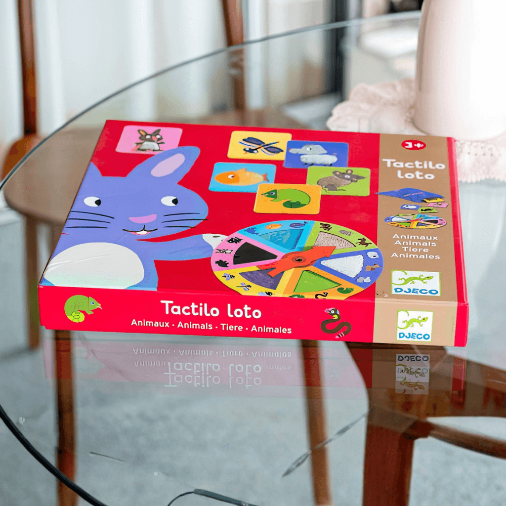 Tactilo Loto animal board game by Djeco packaging box showing contents and gameplay