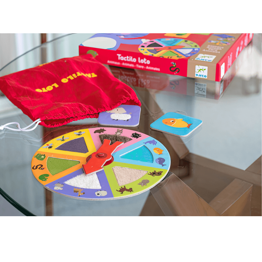 Tactilo Loto sensory board game pieces with animal tiles, spinner and red fabric bag