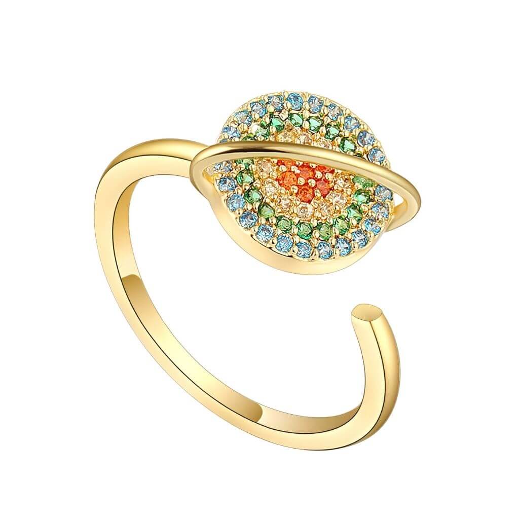 Adjustable planet spinning ring in gold on white background
