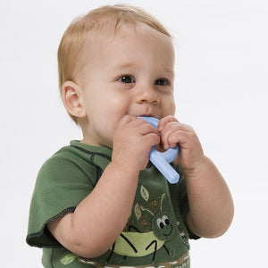 Caucasian infant chewing on Ark's molar teether
