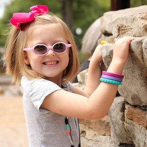 Ark Therapeutic Brick Chew Bracelet with Caucasian Toddler Girl