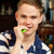 Caucasian teenager boy chewing on Ark's grabber the original motor chew tool as an alternative to grinding teeth