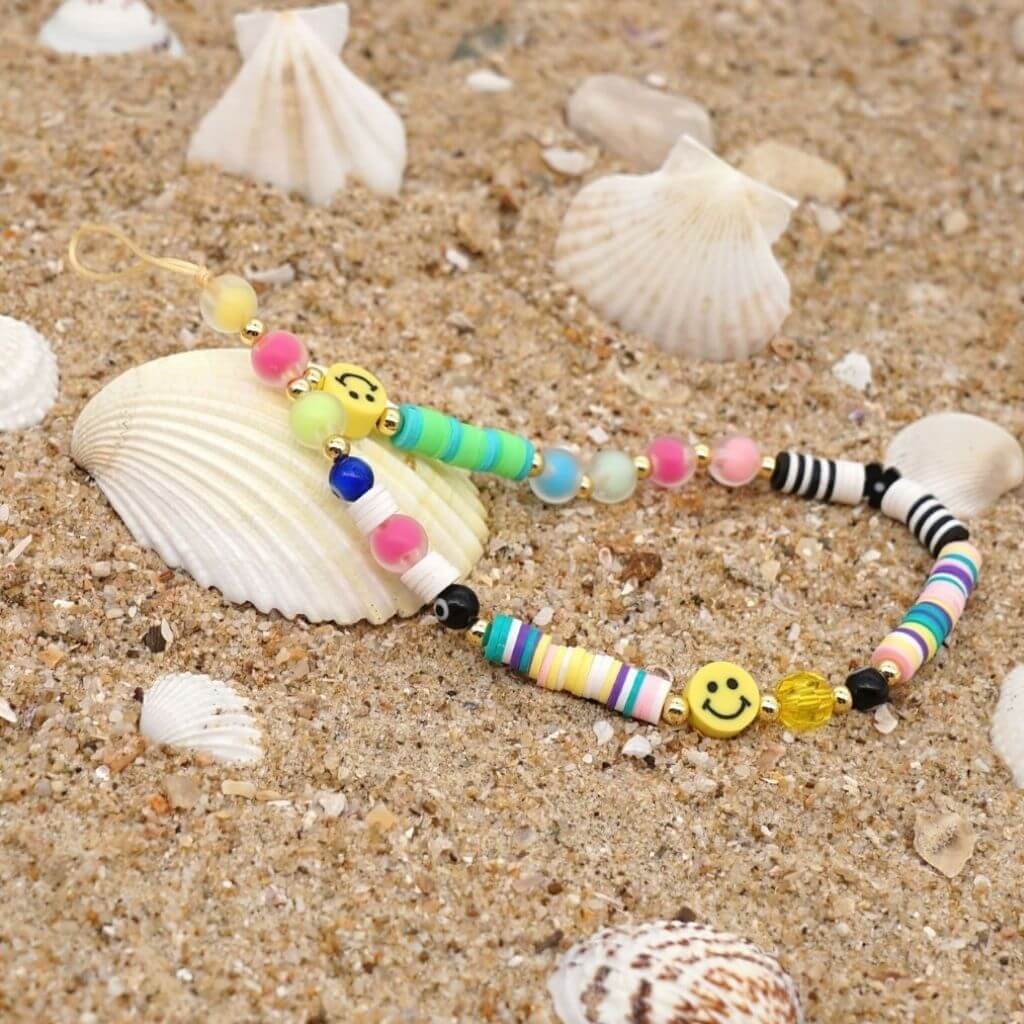 Multi colored bead phone charm with smiles