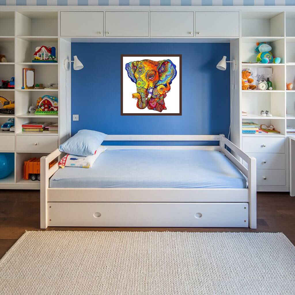 Elephant wooden jigsaw puzzle on a blue wall