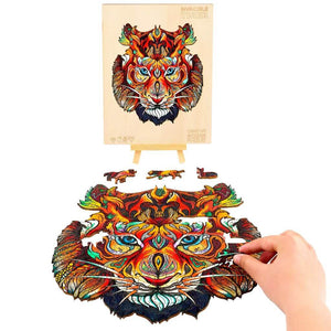 Hands making a tiger timber puzzle