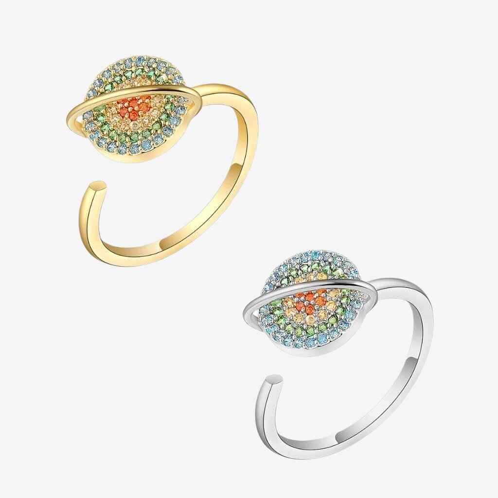 Planet spinner rings in silver and gold on white background in Australia