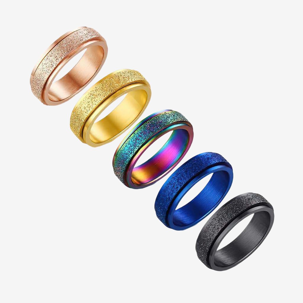 Spinner rings Australia made of sparkly stainless steel on white background