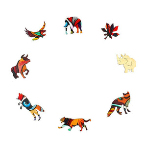 Timber puzzle with animal shaped pieces on white background