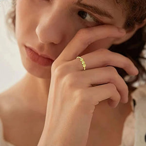 Woman wearing a stainless steel gold resizable ring