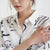 Woman wearing a sterling silver bead anxiety ring